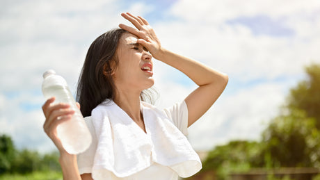 woman-who-is-struggling-to-surive-the-heat-of-the-sun-concepstore.com.ph